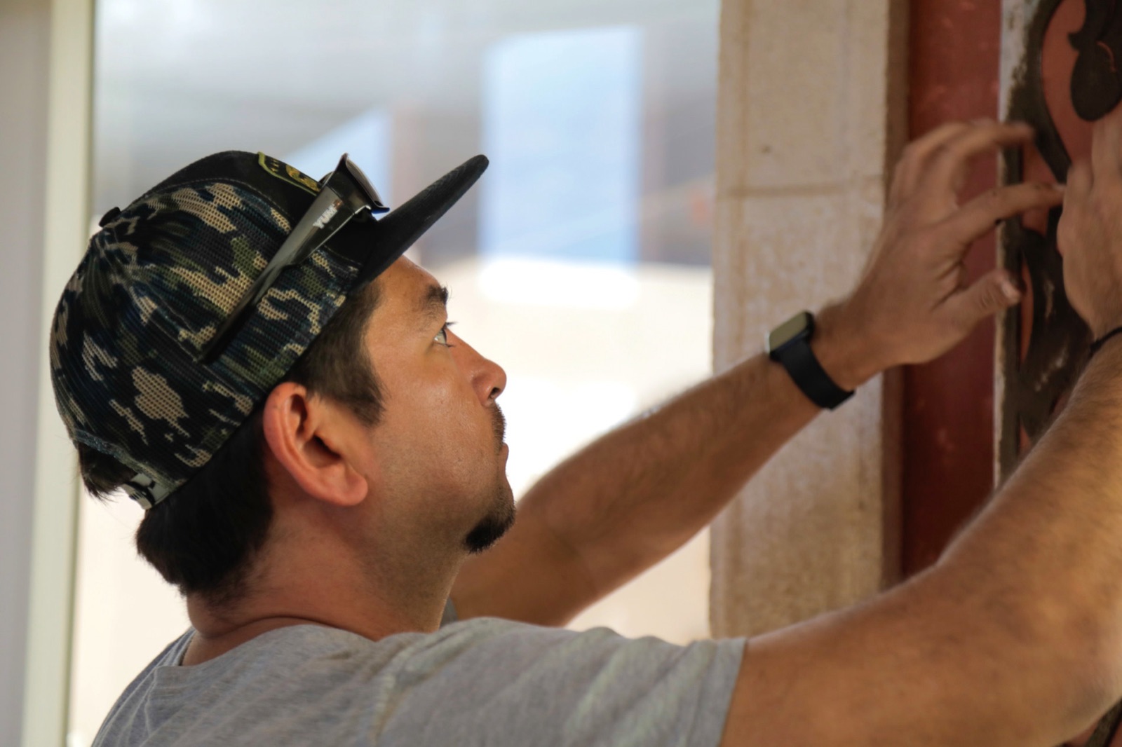 William Meyer applying a decorative finish